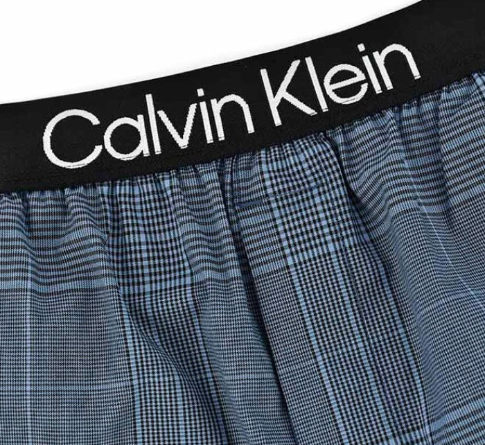 Pánske jogger nohavice - NM2182E - V7G - modrá - Calvin Klein